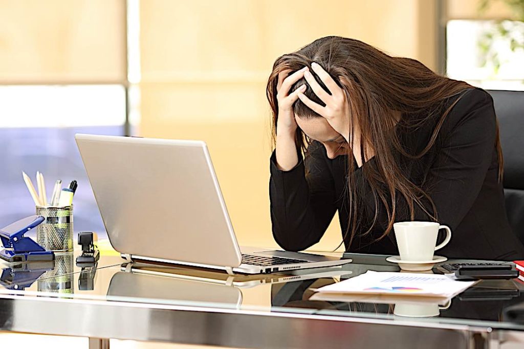 Essential Email Etiquette Tips: “Put Your Hands in the Air and Slowly Step Away from the Keyboard” 3 worker faces information overload in email box dreamstime m 76587031 Pivotal HR Solutions Blog
